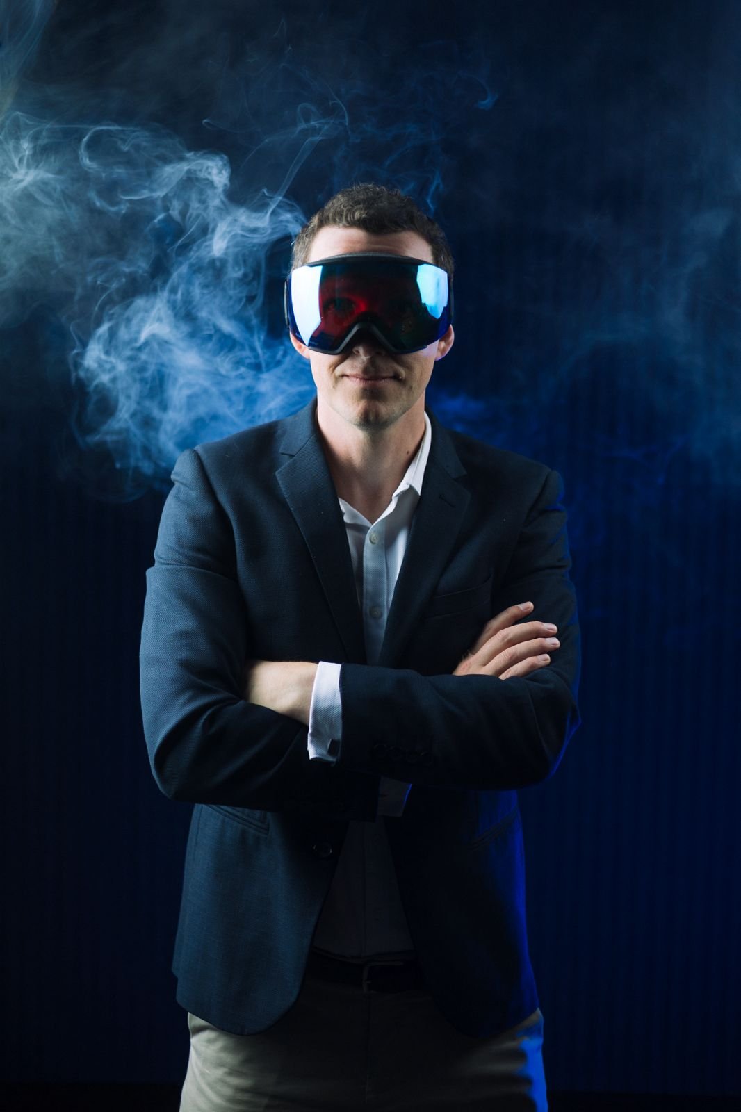 photo of Andy Parker from Understand Your Group with reflective ski goggles on with smoke in the background.